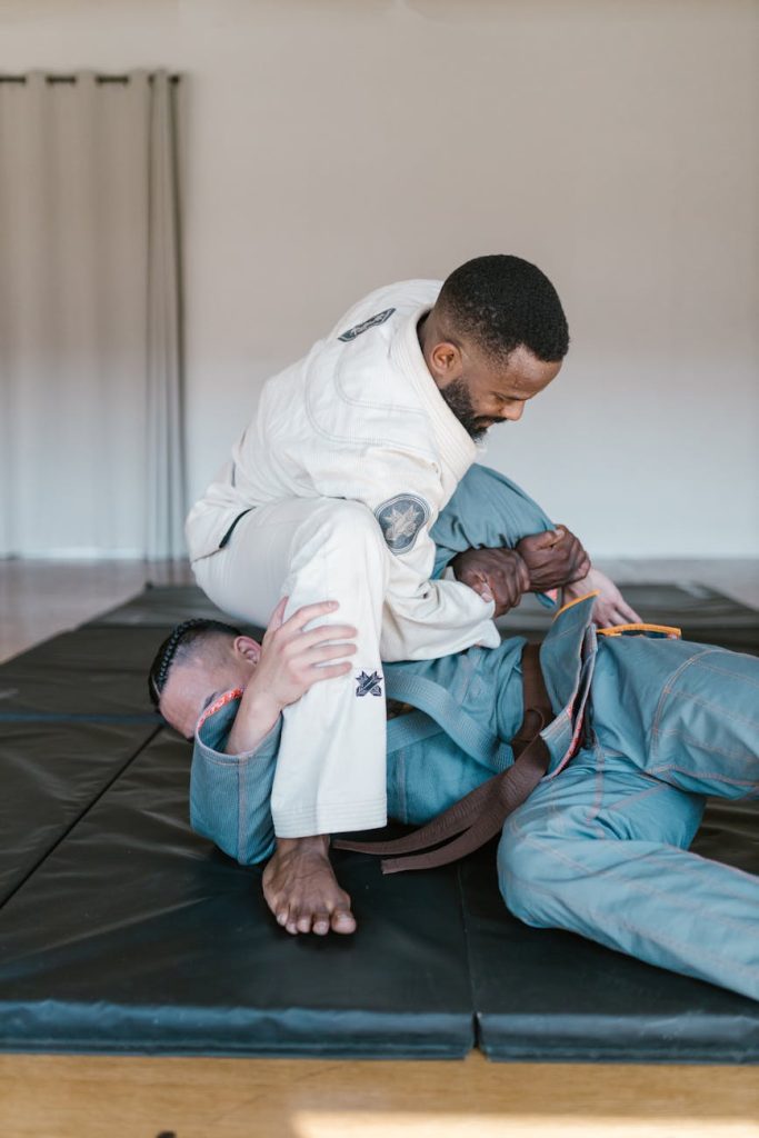a pair of taekwondo athletes sparring